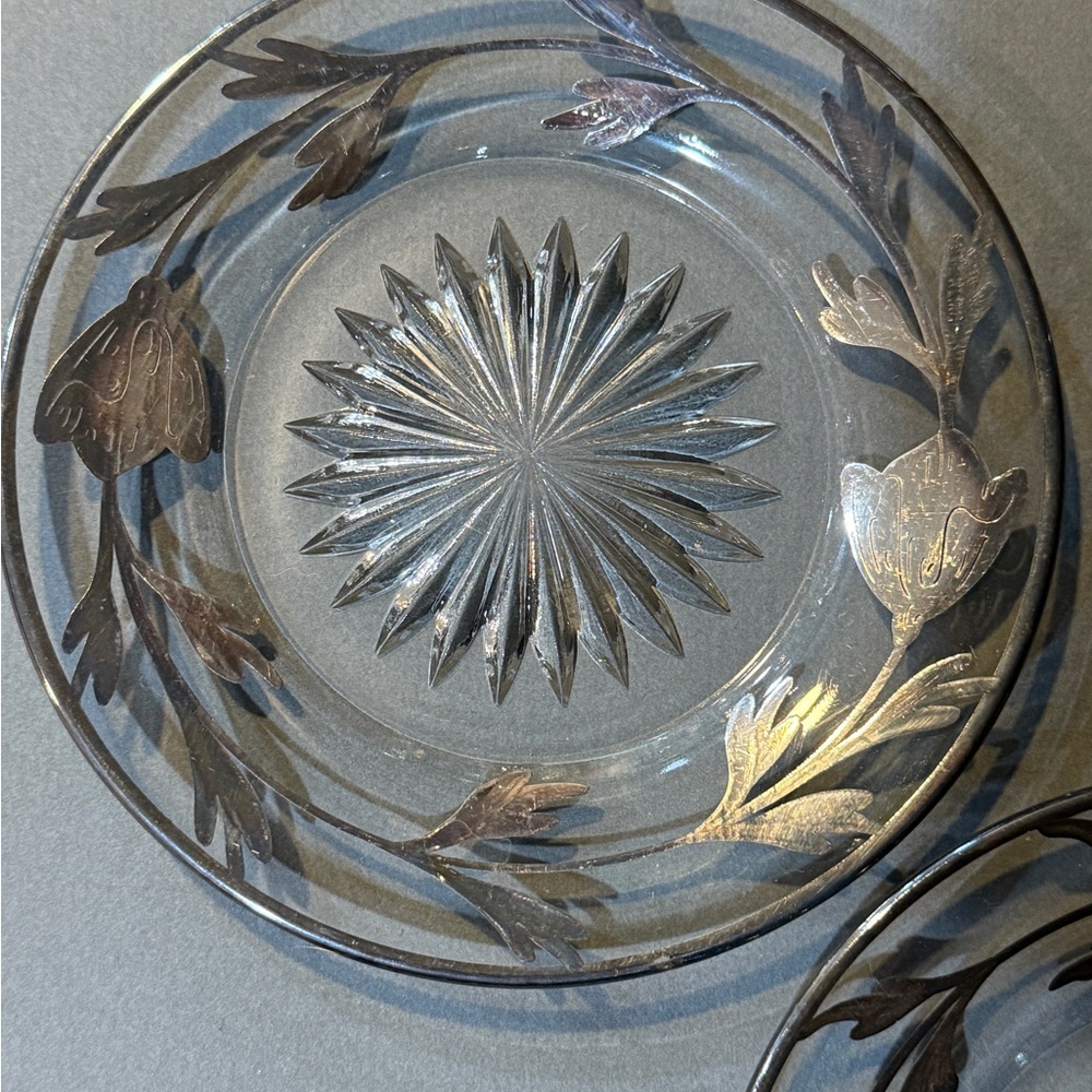 Vintage clear glass plate with a silver overlay